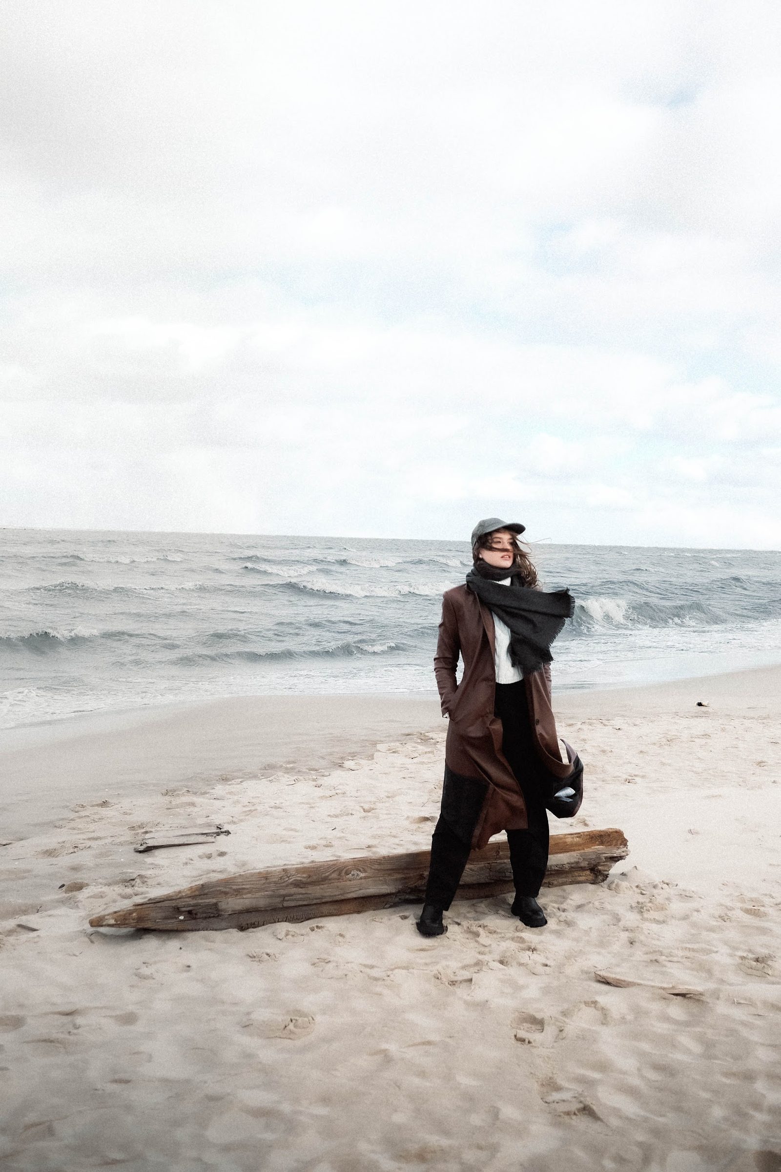 Figure on a windswept beach